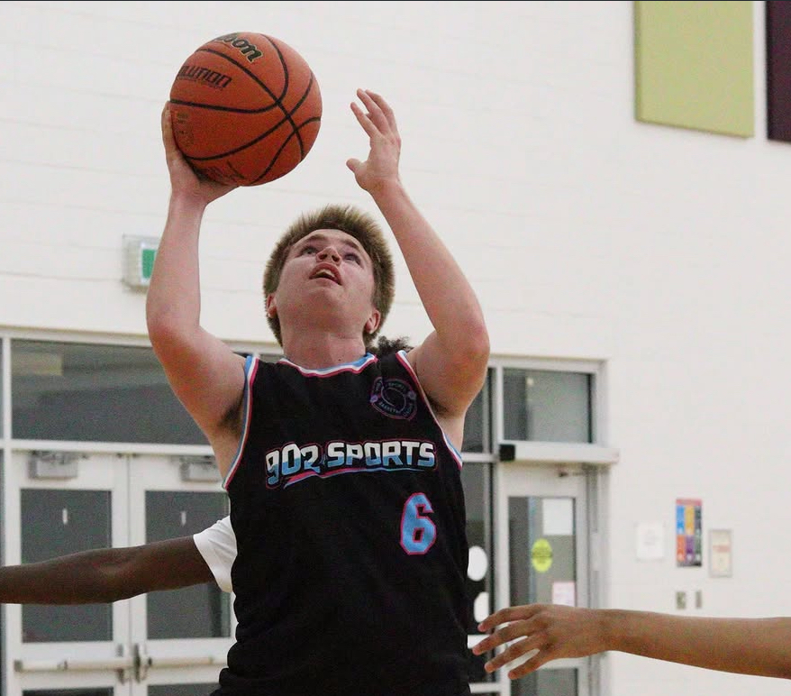 902 Sports player number 6 taking a shot